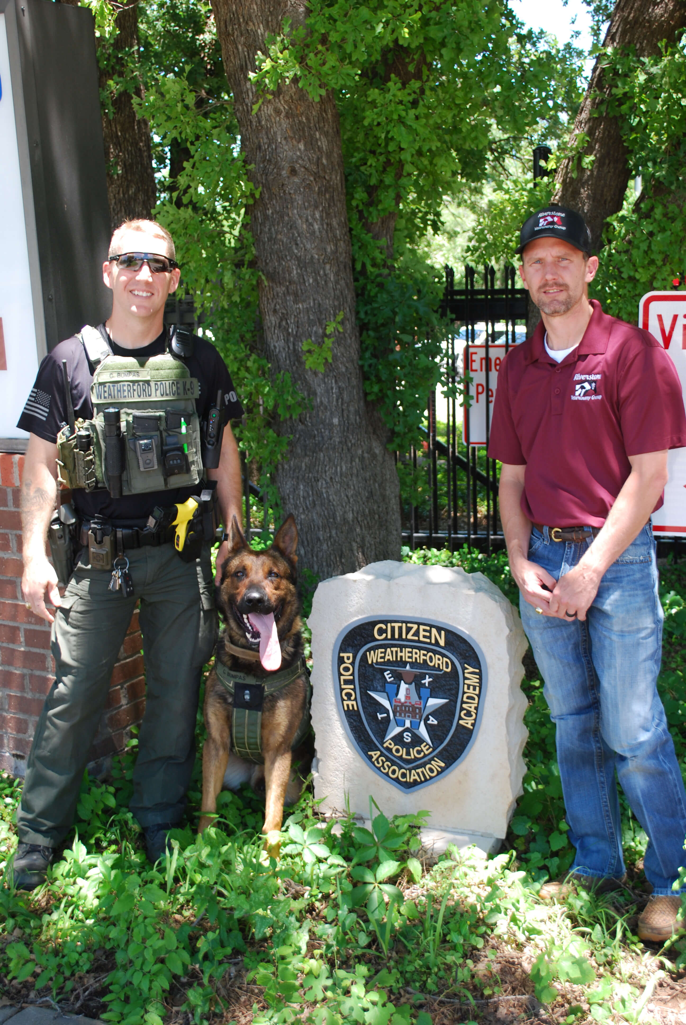 dr.cate-poses-with-k9bruce-and-officer