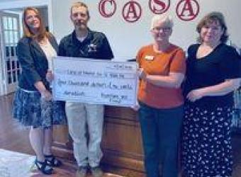 Riverstone Vet Group Presents CASA Hope for Children With a Donation